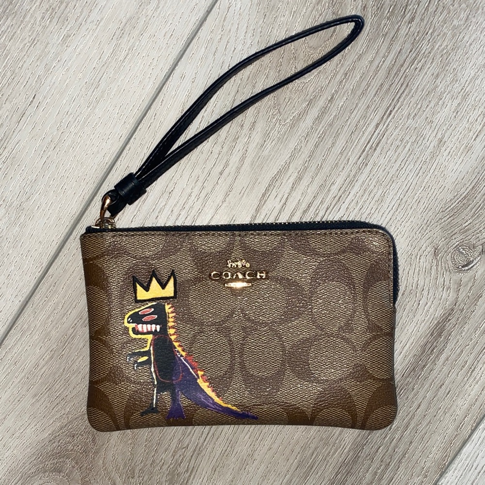 Coach Brown Wristlet with Crowned Dinosaur Design